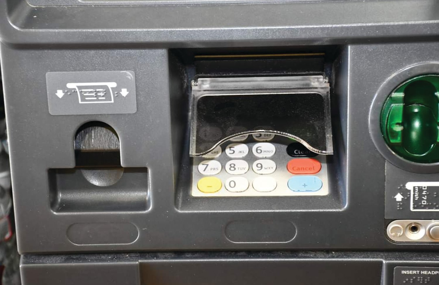 SCAN FIRST: Police found a skimming device attached to this ATM on Killingly Street. If you utilized the machine, check your bank balance and report any suspicious activity to police and your bank.